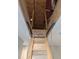 Attic access with folding wooden ladder at 7763 Park Gate Dr, North Charleston, SC 29418