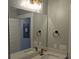 Modern bathroom featuring a spacious mirror, contemporary lighting, and stylish fixtures at 7763 Park Gate Dr, North Charleston, SC 29418