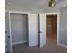 Bedroom featuring closet and adjacent white door at 7763 Park Gate Dr, North Charleston, SC 29418