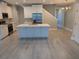 Spacious kitchen featuring a large center island, stainless steel appliances, and white cabinets at 7763 Park Gate Dr, North Charleston, SC 29418