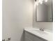 Modern bathroom featuring a stylish vanity, sink, mirror, and fixtures at 8044 Old London Rd, North Charleston, SC 29406