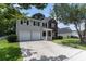 Charming two-story home with a two-car garage and a well-manicured front yard at 8044 Old London Rd, North Charleston, SC 29406
