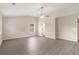 Spacious main bedroom with vaulted ceiling, fan, and one window and a view to the entry door at 8044 Old London Rd, North Charleston, SC 29406