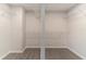 Walk-in closet with shelves and a rod for hanging clothes at 8044 Old London Rd, North Charleston, SC 29406