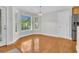 Breakfast nook featuring hardwood floors, natural light, and exterior access at 8618 Woodland Walk, North Charleston, SC 29420