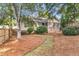 Charming home with well-manicured front yard and inviting entrance at 8618 Woodland Walk, North Charleston, SC 29420