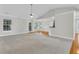 Inviting living room featuring vaulted ceilings, a ceiling fan, and hardwood floors at 8618 Woodland Walk, North Charleston, SC 29420