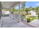 Spacious porch with classic white railing and columns, perfect for relaxing at 8618 Woodland Walk, North Charleston, SC 29420