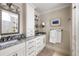 Bathroom featuring double sink vanity with granite countertops and modern fixtures at 914 Red Coat Run, Mount Pleasant, SC 29464