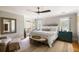 Serene bedroom with a neutral color palette, hardwood floors, and plenty of natural light at 914 Red Coat Run, Mount Pleasant, SC 29464