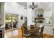 Open dining area with sliding glass doors to a patio, connecting indoor and outdoor living spaces at 914 Red Coat Run, Mount Pleasant, SC 29464