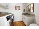 Functional laundry room with modern appliances, a sink, and ample counter space at 914 Red Coat Run, Mount Pleasant, SC 29464