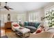 Comfortable living room with plush seating, large windows, and neutral colors at 914 Red Coat Run, Mount Pleasant, SC 29464