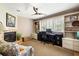 Bright office with built-in shelves, cabinets, and a fireplace, perfect for working from home at 914 Red Coat Run, Mount Pleasant, SC 29464