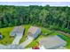 Aerial view of homes with green yards and mature trees creating a private setting at 9808 Wooden Pestle Way, Ladson, SC 29456
