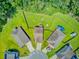Aerial view of a home with a large, fenced backyard and lush surrounding greenery at 9808 Wooden Pestle Way, Ladson, SC 29456