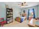 This ' bedroom has carpet floors, ceiling fan, and natural light from the window at 9808 Wooden Pestle Way, Ladson, SC 29456
