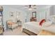 Serene bedroom with a comfortable bed, soft lighting, a cozy chair, and tasteful decor creating a relaxing atmosphere at 9808 Wooden Pestle Way, Ladson, SC 29456