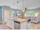 Kitchen featuring a center island with counter seating and stainless steel appliances at 9808 Wooden Pestle Way, Ladson, SC 29456