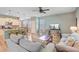 Open concept living space with modern kitchen, dining area, and comfortable living room at 9808 Wooden Pestle Way, Ladson, SC 29456