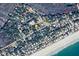 Aerial view of the house and neighborhood close to beach with ocean view at 1014 E Cooper Ave, Folly Beach, SC 29439