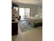 Comfortable bedroom with plush bed, stylish rug, and private balcony access at 1014 E Cooper Ave, Folly Beach, SC 29439