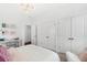 Bright bedroom featuring a desk with clear chair, shelving, and a modern light fixture at 1035 Tea Time Dr, Summerville, SC 29485