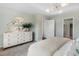 Bright main bedroom with carpeted floors, dresser, and views to other areas of the house at 1035 Tea Time Dr, Summerville, SC 29485