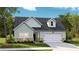 Charming single-Gathering home showcasing brick accents, gray roof, pleasant lawn, and an attached two-car garage at 1045 Tulip Shell St, Summerville, SC 29485