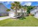 Inviting two-story home with lush green lawn, vibrant landscaping, and a welcoming facade at 105 Lovette Ct, Goose Creek, SC 29445