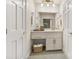Clean bathroom with white vanity, ample storage, and stylish fixtures, providing a refreshing and functional space at 105 Spring St, Summerville, SC 29485