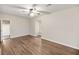 Well-lit bedroom with laminate flooring, neutral paint, and a modern ceiling fan at 105 Spring St, Summerville, SC 29485