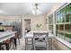 Bright eat-in kitchen with stainless steel appliances, granite countertops, and a dining table at 105 Spring St, Summerville, SC 29485