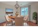 Elegant dining room with hardwood floors and chandelier lighting at 1158 Village Creek Ln # 4, Mount Pleasant, SC 29464