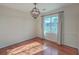 Bright dining area featuring hardwood floors and a chandelier fixture at 1158 Village Creek Ln # 4, Mount Pleasant, SC 29464