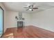 Bright living room featuring a fireplace, ceiling fan, and hardwood flooring at 1158 Village Creek Ln # 4, Mount Pleasant, SC 29464