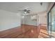 Open-concept living room with hardwood floors, connecting to the kitchen and sunroom at 1158 Village Creek Ln # 4, Mount Pleasant, SC 29464
