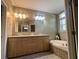 Bright bathroom with a corner tub, double vanity, and neutral tile flooring at 1173 Penny Creek Dr, Ruffin, SC 29475