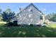 Home exterior featuring vinyl siding, mature landscaping and ample yard space at 1173 Penny Creek Dr, Ruffin, SC 29475