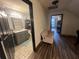 Hallway with beautiful floors showing the entrance to a cozy sitting area and bathroom at 1173 Penny Creek Dr, Ruffin, SC 29475