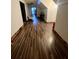 Hallway featuring attractive wood-look floors, leading to other rooms of the house at 1173 Penny Creek Dr, Ruffin, SC 29475