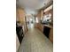 The spacious kitchen features a sleek black dishwasher and a view of the back door at 1173 Penny Creek Dr, Ruffin, SC 29475
