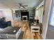 Spacious living room with built-in shelving, fireplace, and ample natural light at 1173 Penny Creek Dr, Ruffin, SC 29475