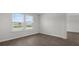 Bedroom with wood flooring and natural light from the window at 143 Haventree Ct, Summerville, SC 29486