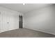 Bright bedroom features plush carpet, closet, and a neutral paint palette at 143 Haventree Ct, Summerville, SC 29486