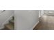 Hallway featuring stairs leading to the second floor and wood-look flooring at 143 Haventree Ct, Summerville, SC 29486