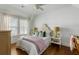 Cozy bedroom with patterned headboard, desk, and ample natural light at 1466 Mizzen Aly, Johns Island, SC 29455