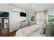 Comfortable bedroom with hardwood floors, ample light, and neutral decor at 1466 Mizzen Aly, Johns Island, SC 29455