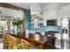 Bright kitchen features a large island, white cabinets, stainless appliances, and modern pendant lighting at 1466 Mizzen Aly, Johns Island, SC 29455