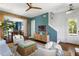 Comfortable living room with open view of dining area and staircase at 1466 Mizzen Aly, Johns Island, SC 29455